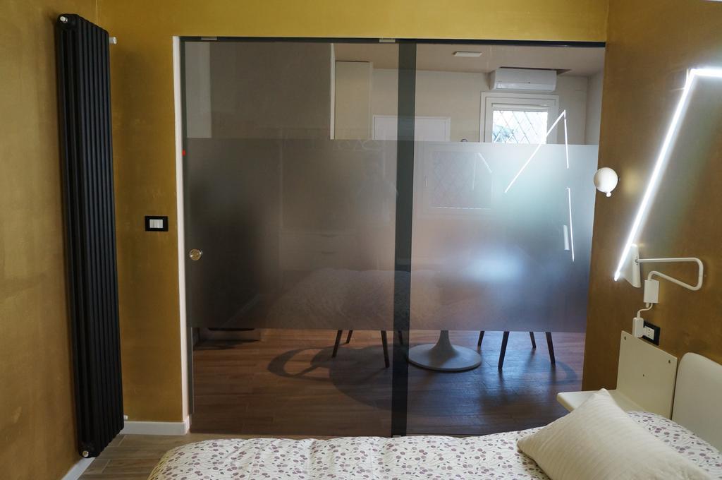 San Donato 40 Apartman Bologna Szoba fotó